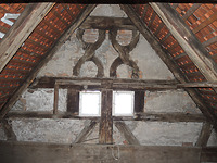 Blick auf das südwestliche Giebeldreieck im 2. Dachgeschoss mit den geschweiften Andreaskreuzen des ehemaligen Zierfachwerks / Wohnhaus in 73479 Ellwangen (Jagst) (29.07.2014 - Markus Numberger) Blick auf das südwestliche Giebeldreieck im 2. Dachgeschoss mit den geschweiften Andreaskreuzen des ehemaligen Zierfachwerks / Wohnhaus in 73479 Ellwangen (Jagst) (29.07.2014 - Markus Numberger)