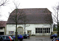 Zehntscheuer Schömberg, nördliche Traufseite, urspr. mit zwei rundbogigen Toren (Foto: R. Allgaier, Schömberg)  / Zehntscheuer in 72355 Schömberg